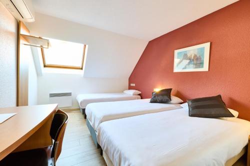 Habitación Triple - 3 camas individuales del hotel Primo Colmar Centre. Foto 1