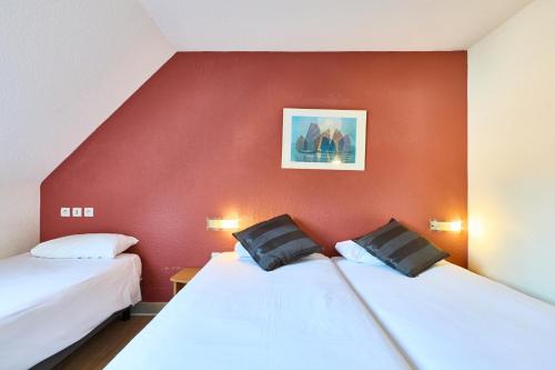 Habitación Triple - 3 camas individuales del hotel Primo Colmar Centre. Foto 2