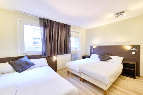 Habitación Cuádruple - 4 camas individuales del hotel Primo Colmar Centre