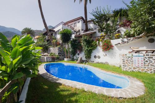 Suite Deluxe con vistas a la montaña y a la piscina del hotel Los Telares