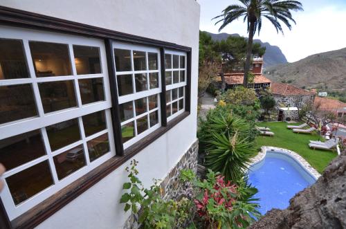 Suite Deluxe con vistas a la montaña y a la piscina del hotel Los Telares. Foto 5