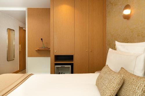 Habitación Clásica del hotel Madison Hotel. Foto 4
