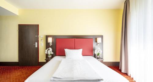 Habitación Individual Confort del hotel PLAZA Premium Salzburg. Foto 7