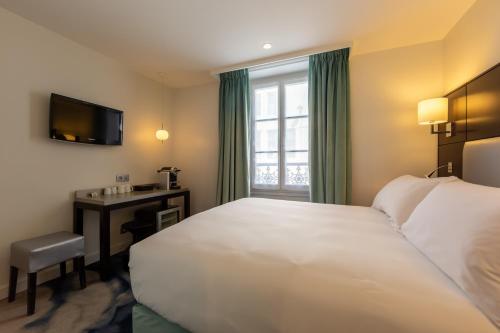 Dos Habitaciones Doble Estándar Comunicadas del hotel 15 Montparnasse. Foto 4