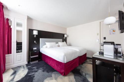 Habitación Triple con bañera del hotel 15 Montparnasse