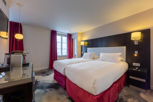 Habitación Triple con bañera del hotel 15 Montparnasse. Foto 4