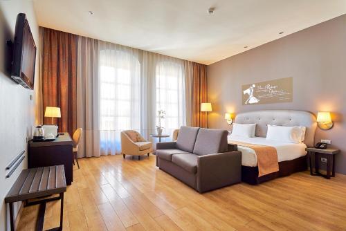 Habitación Doble con cama supletoria del hotel Eurostars Patios De Córdoba