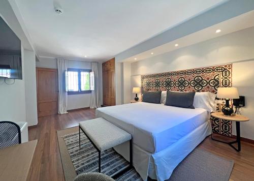 Habitación Triple del hotel Soho Boutique Atalia. Foto 1