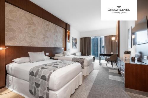 Habitación Executive - 2 camas del hotel Riu Plaza Panamá. Foto 4