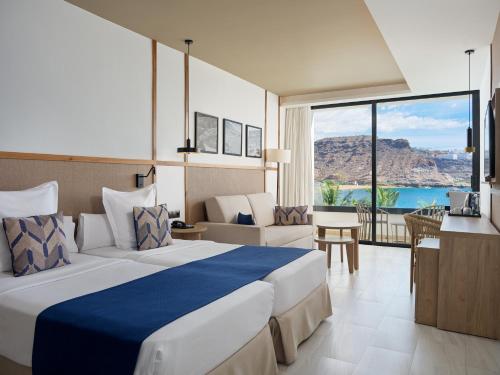 Suite Junior con vistas al mar del hotel H10 Costa Mogán