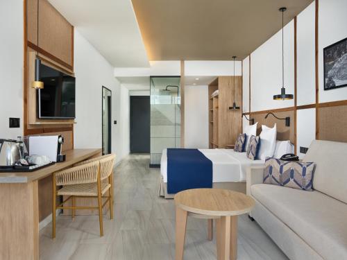 Junior suite Vista Mar Balcón o Terraza Sofá Cama incluido 2 Camas individuales del hotel H10 Costa Mogán. Foto 5