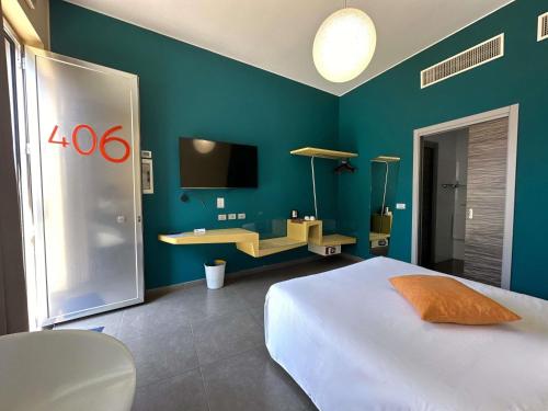 Habitación Clásica con cama grande y vistas a la montaña del hotel Ibis Styles Catania Acireale. Foto 1