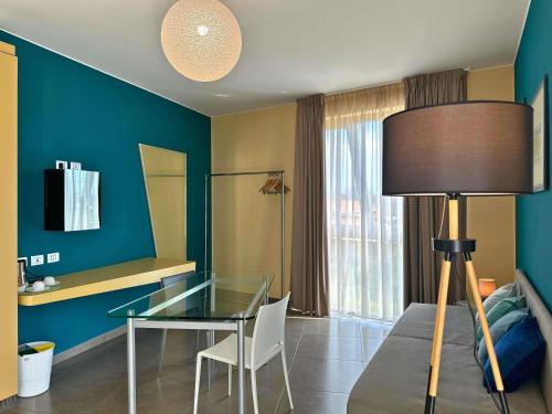 Suite Deluxe con 2 camas dobles del hotel Ibis Styles Catania Acireale. Foto 1