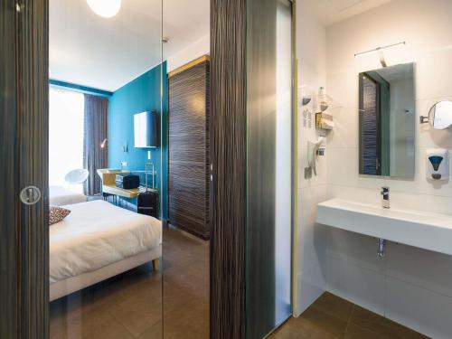 Suite Deluxe con 2 camas dobles del hotel Ibis Styles Catania Acireale. Foto 8