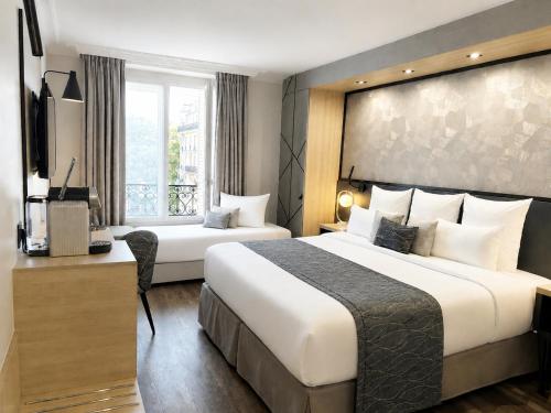 Habitación Triple Deluxe con 1 cama extragrande y 1 cama individual - No fumadores del hotel Best Western Opera Batignolles. Foto 2