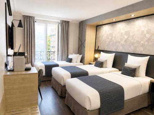 Habitación Triple Deluxe con 1 cama extragrande y 1 cama individual - No fumadores del hotel Best Western Opera Batignolles. Foto 5