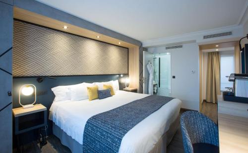 Habitación Deluxe con cama extragrande del hotel Best Western Opera Batignolles. Foto 2