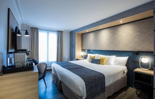 Habitación Triple Deluxe con 1 cama extragrande y 1 cama individual - No fumadores del hotel Best Western Opera Batignolles. Foto 2