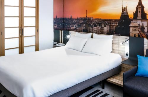 Habitación Superior - 1 cama grande del hotel Novotel Paris 14 Porte d'Orléans. Foto 8