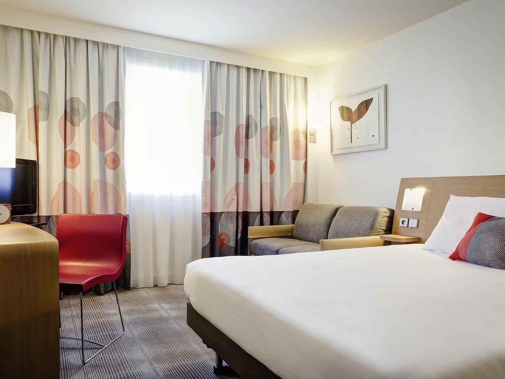 Habitación Clásica - 1 cama doble y 1 sofá - cama individual del hotel Novotel Lyon Gerland Musée Des Confluences