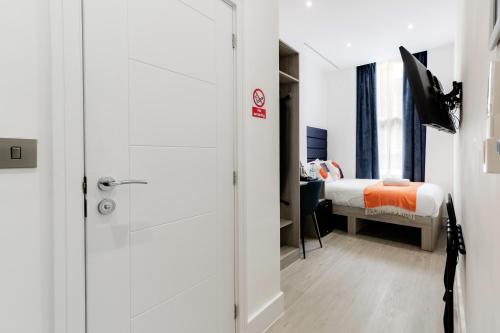 Habitación Doble Estándar del hotel Oyo Boston Court. Foto 4