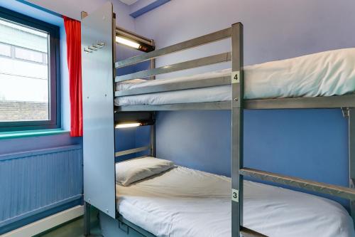 Habitación compartida femenina de 4 camas del hotel Clink 261 Hostel. Foto 1