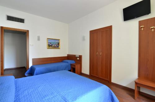 Habitación Triple del hotel Tex