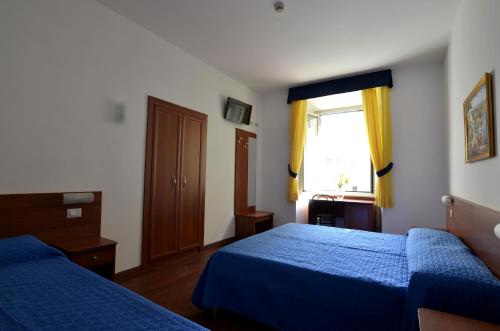 Habitación Triple del hotel Tex. Foto 3