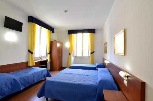 Habitación Cuádruple Clásica del hotel Tex
