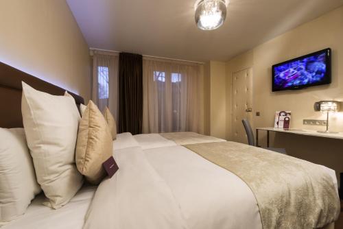 Habitación Doble Clásica con Dos Camas del hotel Mercure Paris Place D'Italie. Foto 2