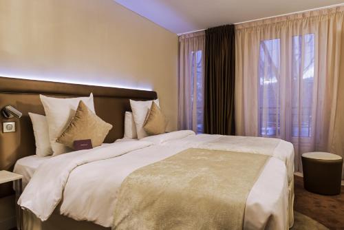 Habitación Doble Clásica con Dos Camas del hotel Mercure Paris Place D'Italie. Foto 3