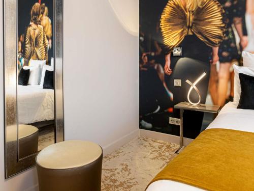 Habitación Clásica Accesible con una Cama Doble del hotel Mercure Paris Place D'Italie. Foto 6