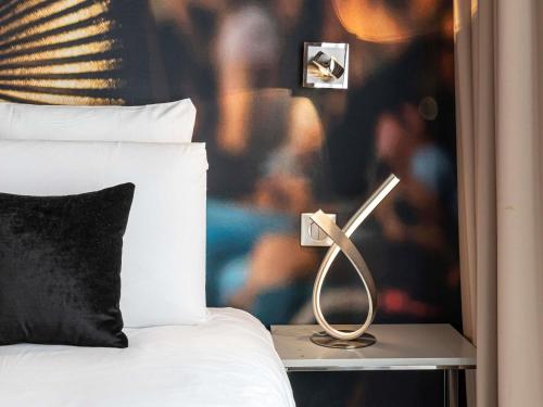 Habitación Triple Clásica del hotel Mercure Paris Place D'Italie. Foto 5
