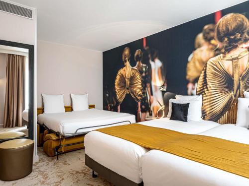 Habitación Clásica - 3 camas individuales del hotel Mercure Paris Place D'Italie. Foto 1