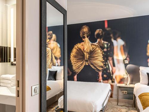Habitación Clásica - 3 camas individuales del hotel Mercure Paris Place D'Italie. Foto 7