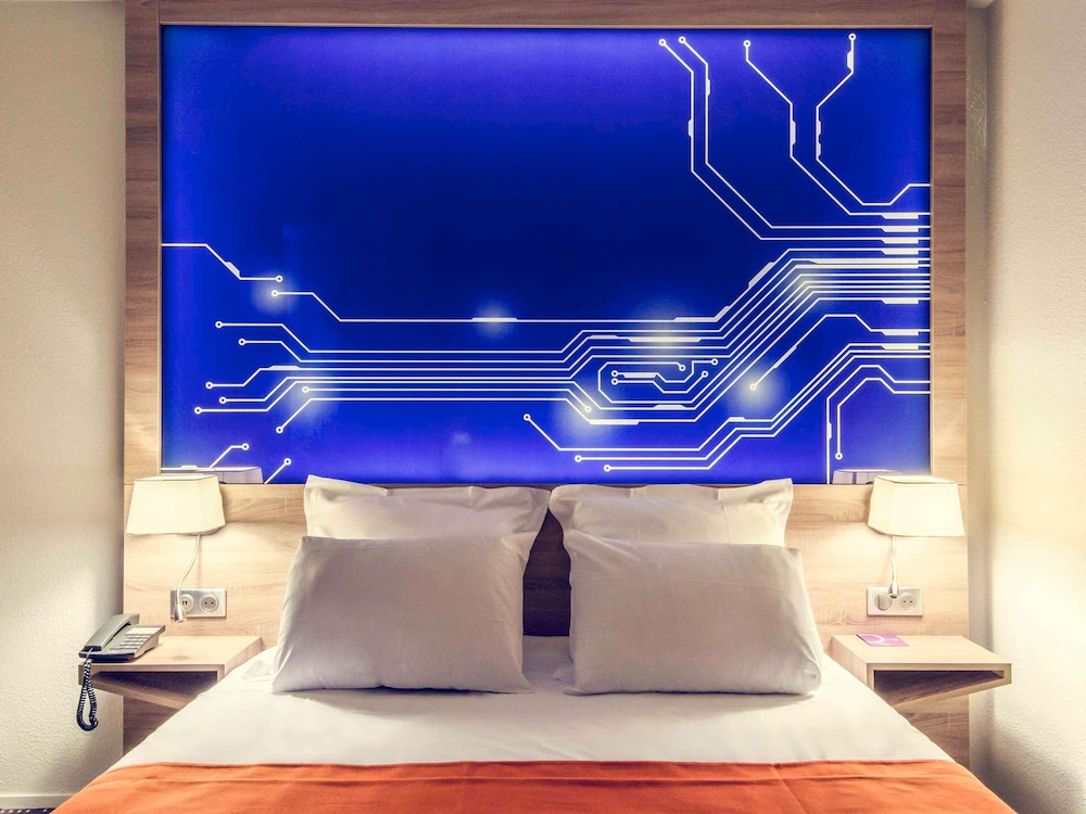 Habitación Clásica, cama doble del hotel Mercure Poitiers Site Du Futuroscope. Foto 4