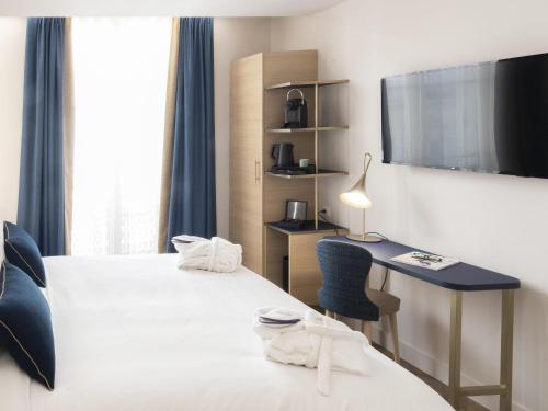 Habitación Doble Privilege del hotel Hôtel Mercure Paris Opéra Lafayette. Foto 3