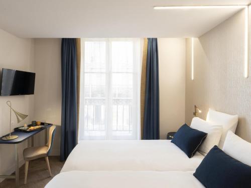Habitación Doble Superior - 2 camas del hotel Hôtel Mercure Paris Opéra Lafayette. Foto 5