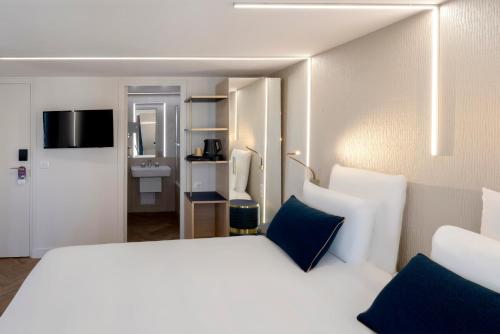 Habitación Doble Privilege del hotel Hôtel Mercure Paris Opéra Lafayette. Foto 7