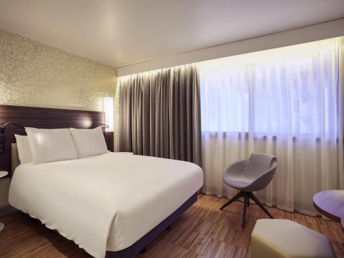 Habitación Doble Superior del hotel Mercure Paris Arc De Triomphe Etoile