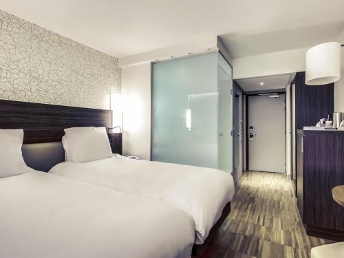 Habitación Doble Superior - 2 camas del hotel Mercure Paris Arc De Triomphe Etoile. Foto 1