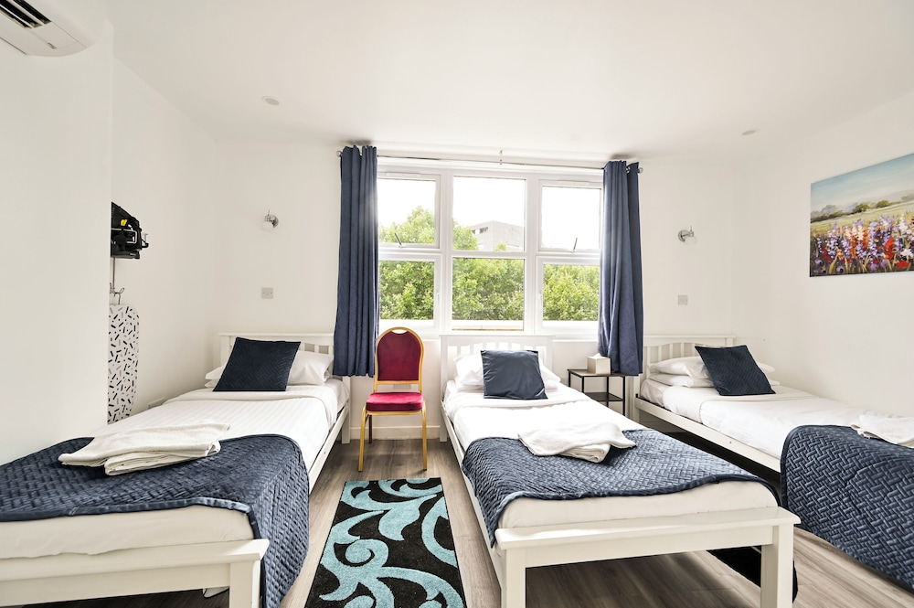 Habitación triple estándar, 3 camas individuales del hotel City London. Foto 3