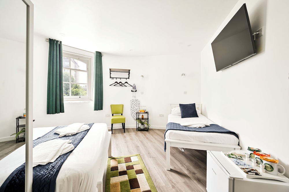 Habitación familiar del hotel City London. Foto 1
