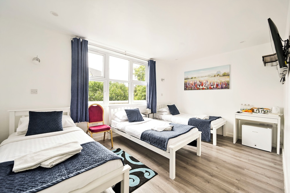 Habitación triple estándar, 3 camas individuales del hotel City London. Foto 5