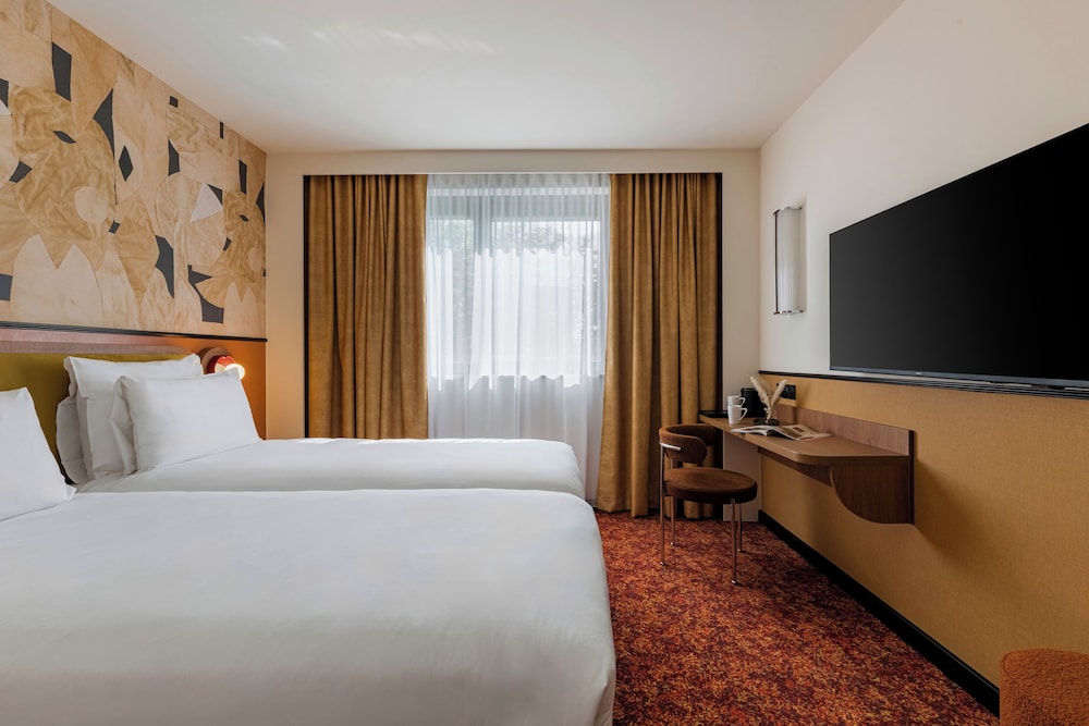 Habitación Clásica - 2 camas individuales del hotel Mercure Lyon Centre Lumière. Foto 3