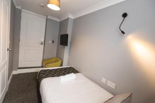 Habitación Individual del hotel Comfotel Grn. Foto 4