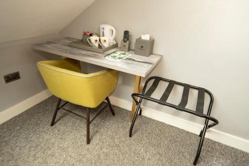 Habitación Triple del hotel Comfotel Grn. Foto 1