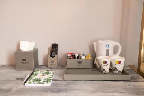 Habitación cuádruple del hotel Comfotel Grn. Foto 2