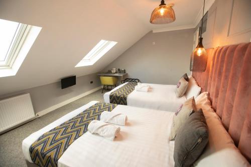 Habitación cuádruple del hotel Comfotel Grn. Foto 8