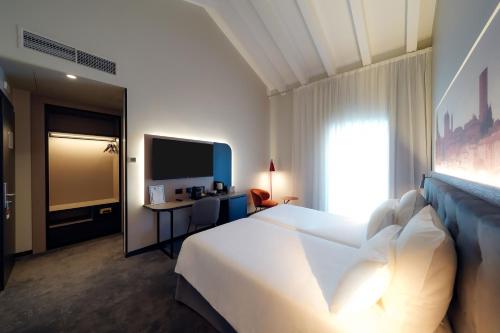 Habitación Doble Privilege del hotel Mercure Bergamo Centro Palazzo Dolci. Foto 2